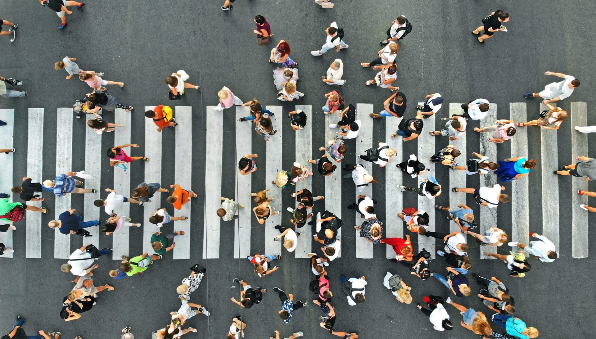 Aerial.,People,Crowd,On,Pedestrian,Crosswalk.,Top,View,Background.