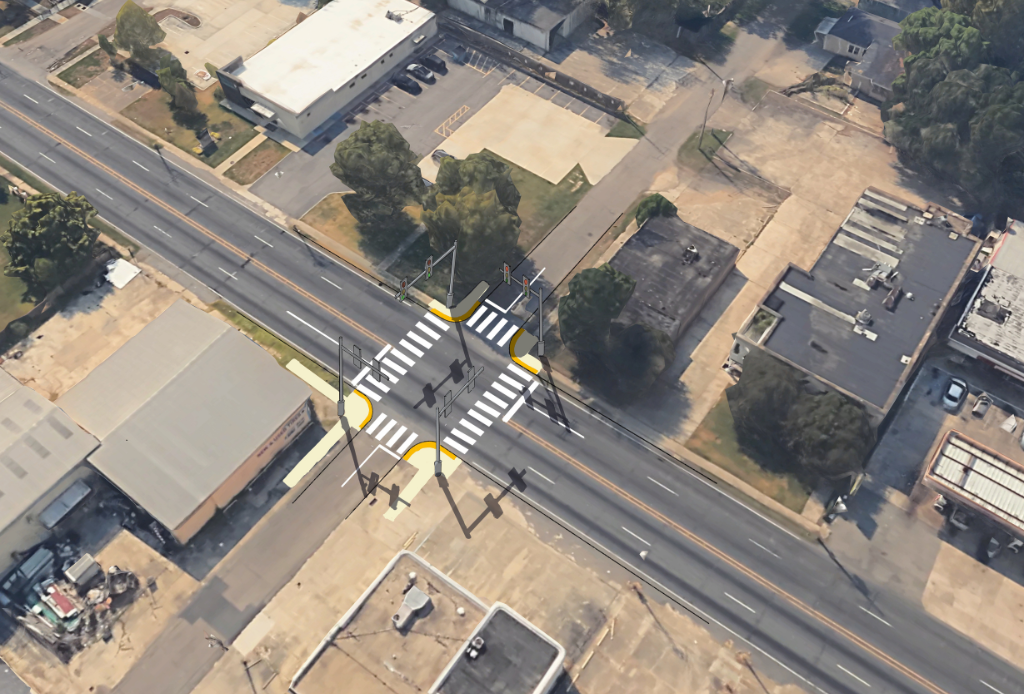 The previous image of a road is overlayed with an illustration of crosswalks and traffic lights, bringing drivers to a full stop before pedestrians cross the street